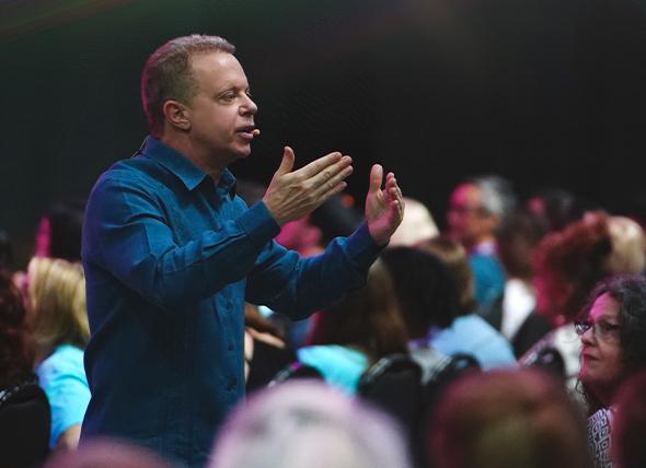 Dr Joe speaking with retreat attendees